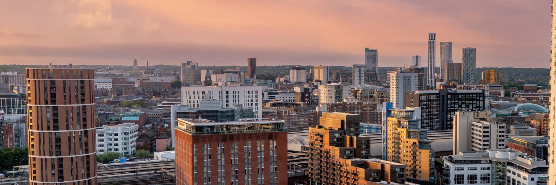 Overhead shot of the Leeds skyline as the sun sets.