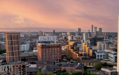 Overhead shot of the Leeds skyline as the sun sets.